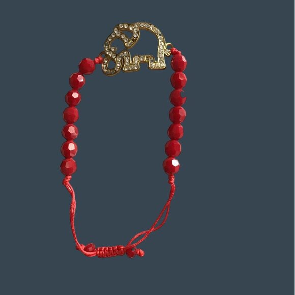 WOMENS RED BEADS WITH ELEPHAN CHARM ADJUSTABLE BRACELET - Picture 1 of 4